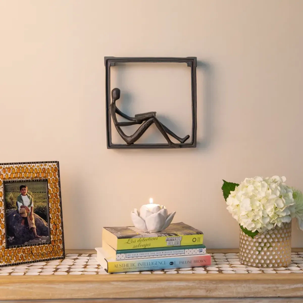 Man Reading on a Window Sill Hanging Wall Art Iron Sculpture