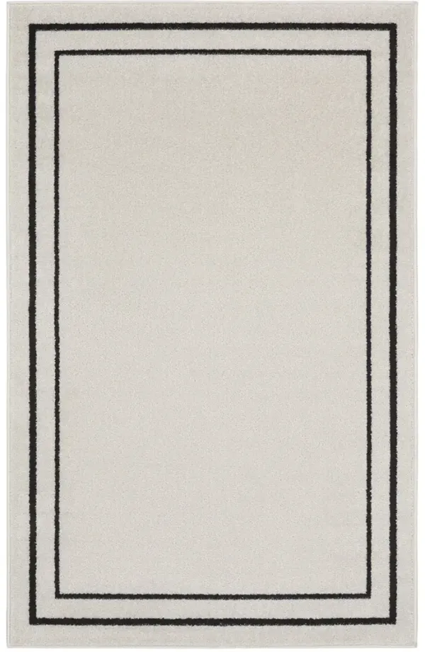 Nourison Essentials NRE02 Ivory/Black 3' x 5' Rug