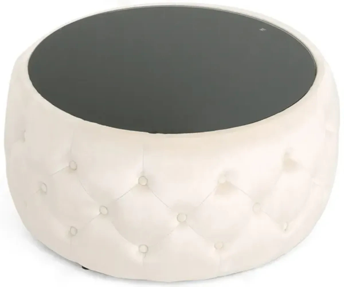 Ottoman Coffee Table, Beige Tufted Velvet, 30 Inch Round Glass Top - Benzara