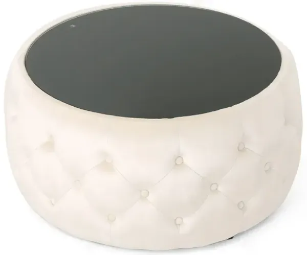 Ottoman Coffee Table, Beige Tufted Velvet, 30 Inch Round Glass Top - Benzara