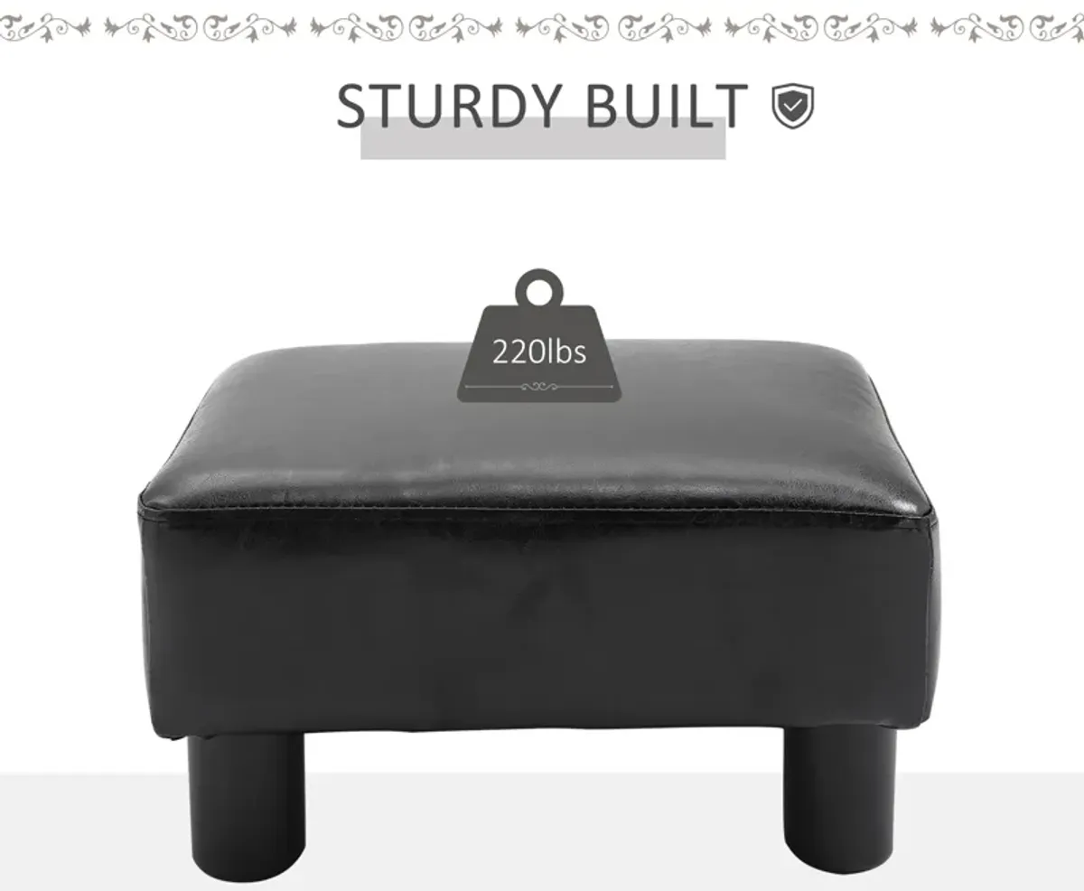 HOMCOM Ottoman Foot Rest, Small Foot Stool with Faux Leather Upholstery, Rectangular Ottoman Footrest with Padded Foam Seat and Plastic Legs, Bright Black