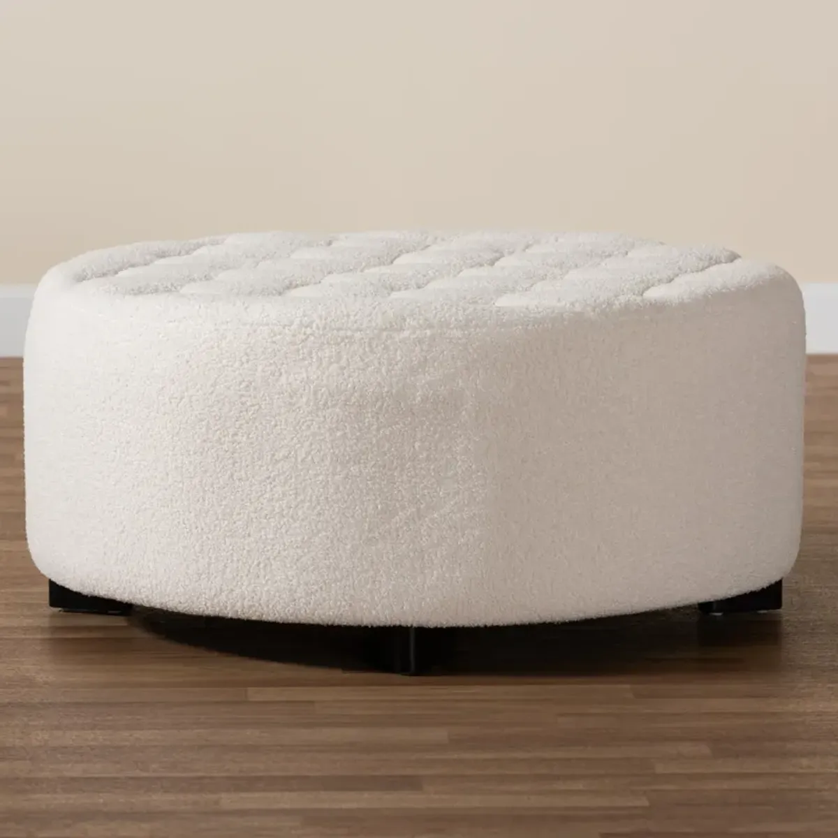 Baxton Studio Athena Modern and Ivory Boucle Upholstered and Black Finished Round Ottoman