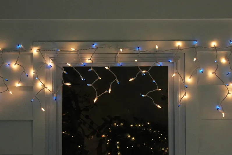 50 Blue and Clear Mini Window Curtain Icicle Christmas Lights - 2.6 ft White Wire