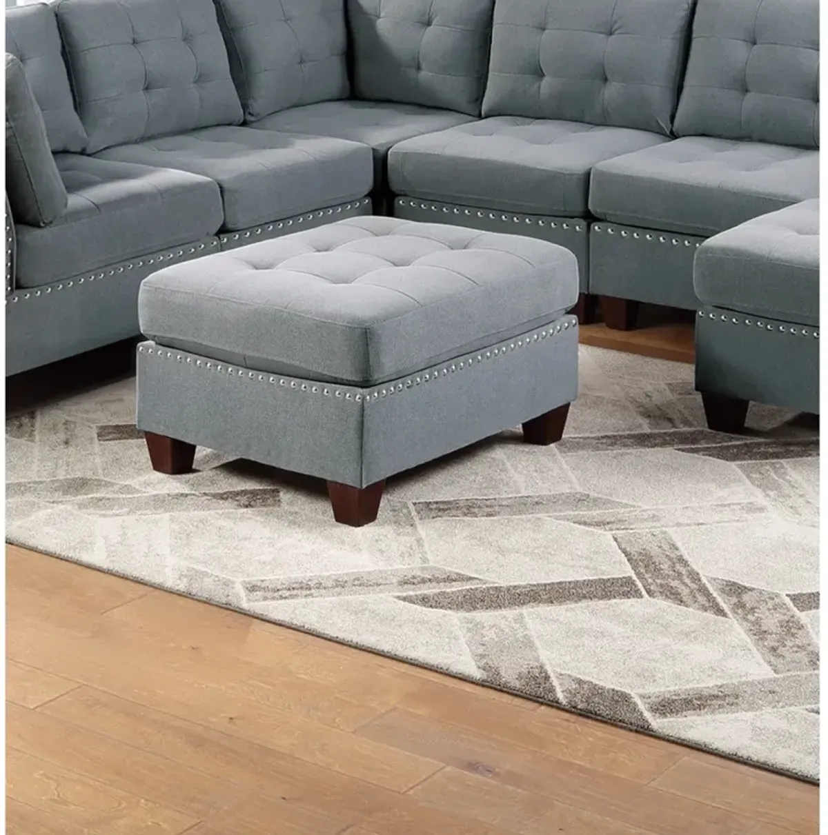 Grey Tufted Ottoman with Nailhead Trim and Wooden Legs