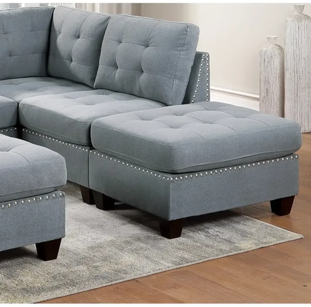 Grey Tufted Ottoman with Nailhead Trim and Wooden Legs