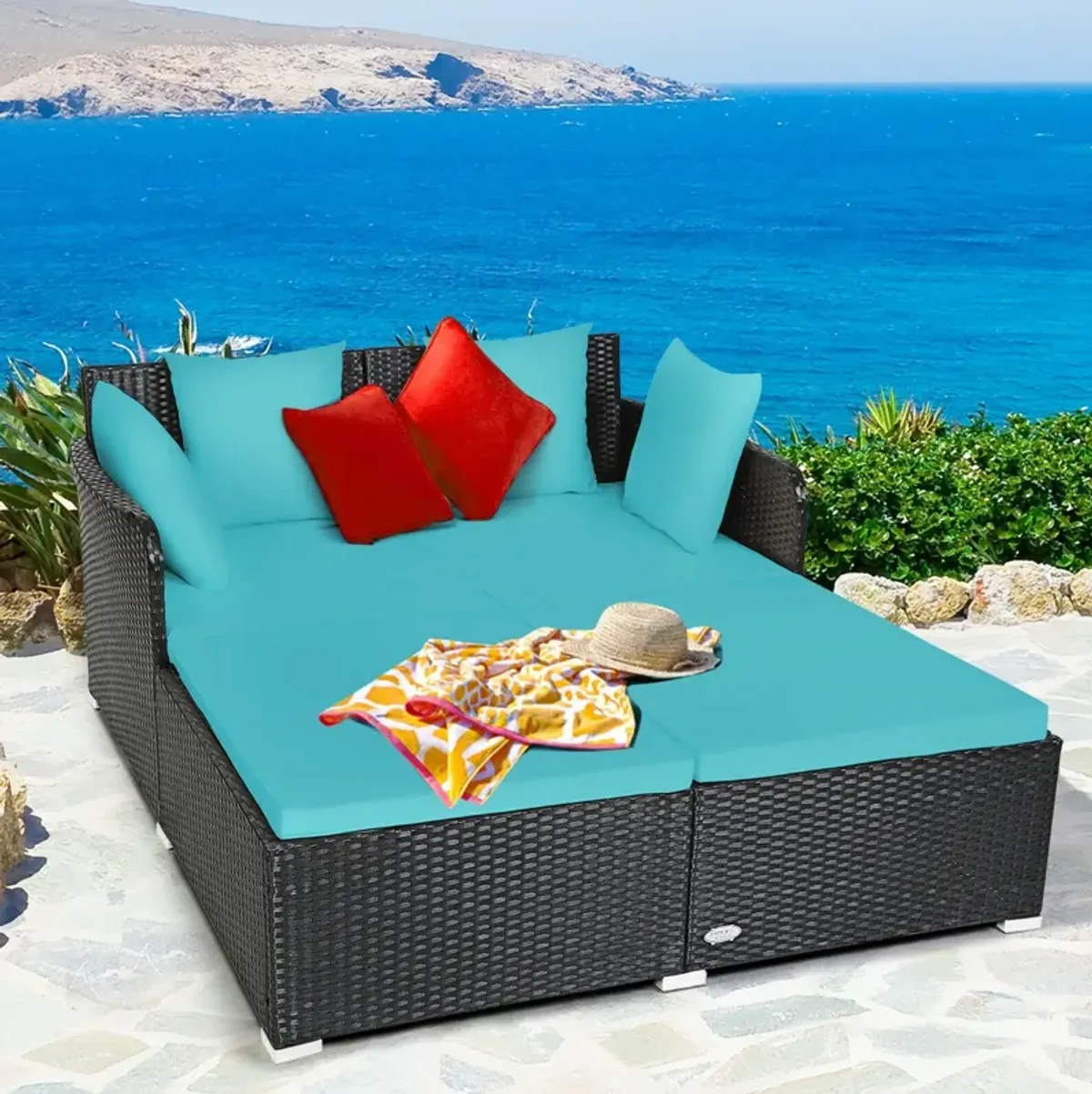 Spacious Outdoor Rattan Daybed with Upholstered Cushions and Pillows