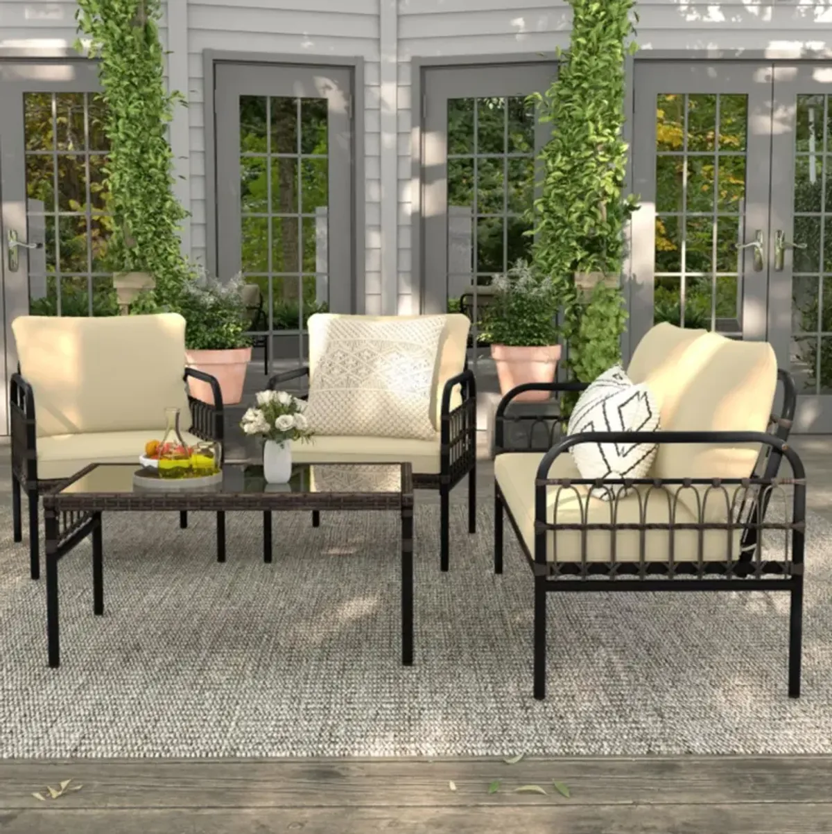 Hivvago 4 Pieces Outdoor Wicker Conversation Bistro Set with Soft Cushions and Tempered Glass Coffee Table