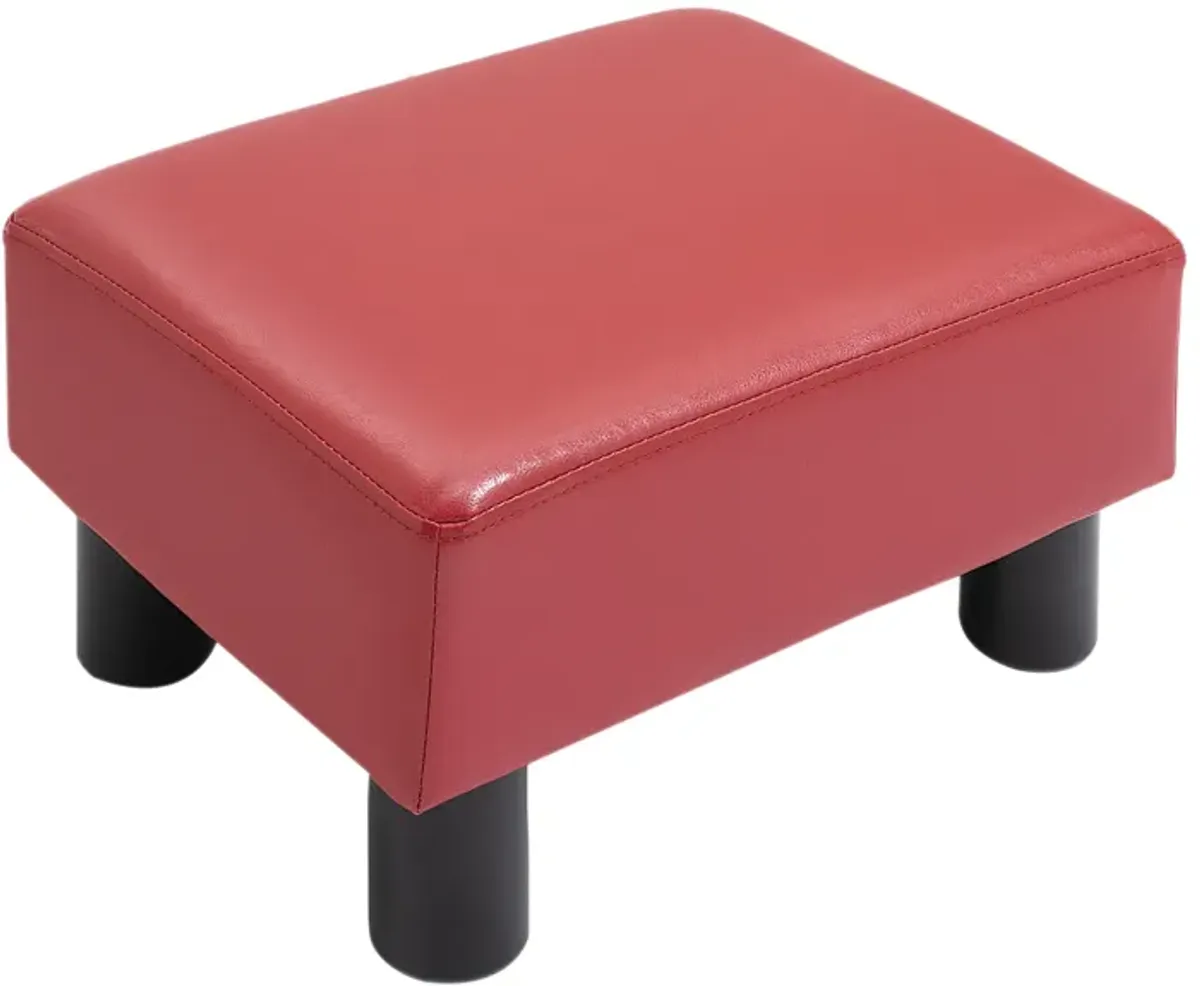 HOMCOM Ottoman Foot Rest, Small Foot Stool with Faux Leather Upholstery, Rectangular Ottoman Footrest with Padded Foam Seat and Plastic Legs, Bright Black