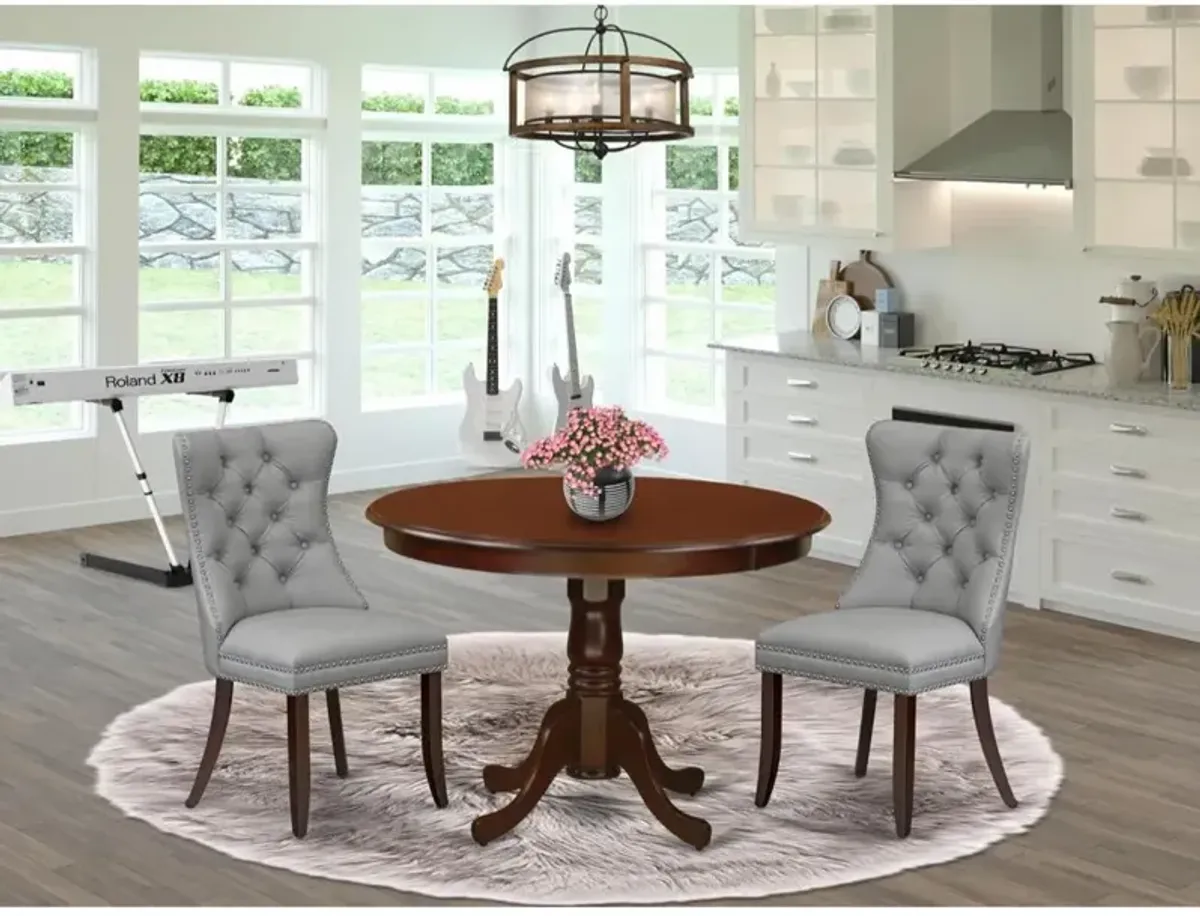 3 Piece Dining Set Consists of a Round Kitchen Table with Pedestal