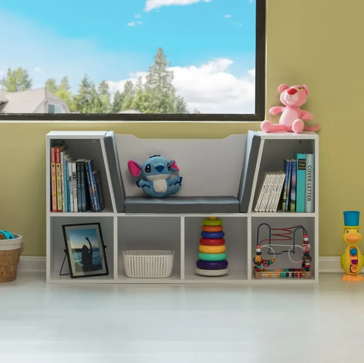 White Modern Multi-Purpose Bookshelf with Storage Space and Gray Cushioned Reading Nook