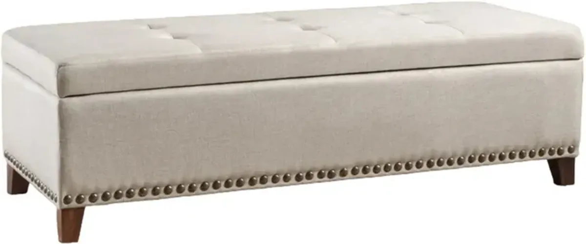 Nancy Storage Ottoman Bench, 51 Inch Beige Fabric, Brass Nailhead Trim - Benzara