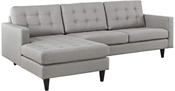 Empress Left-Arm Sectional Sofa - Luxurious Design with Tufted Buttons, Cushions, and Noble Armrests. Solid Wood Legs with Floor-Protecting Glides. Lavish Upholstery.