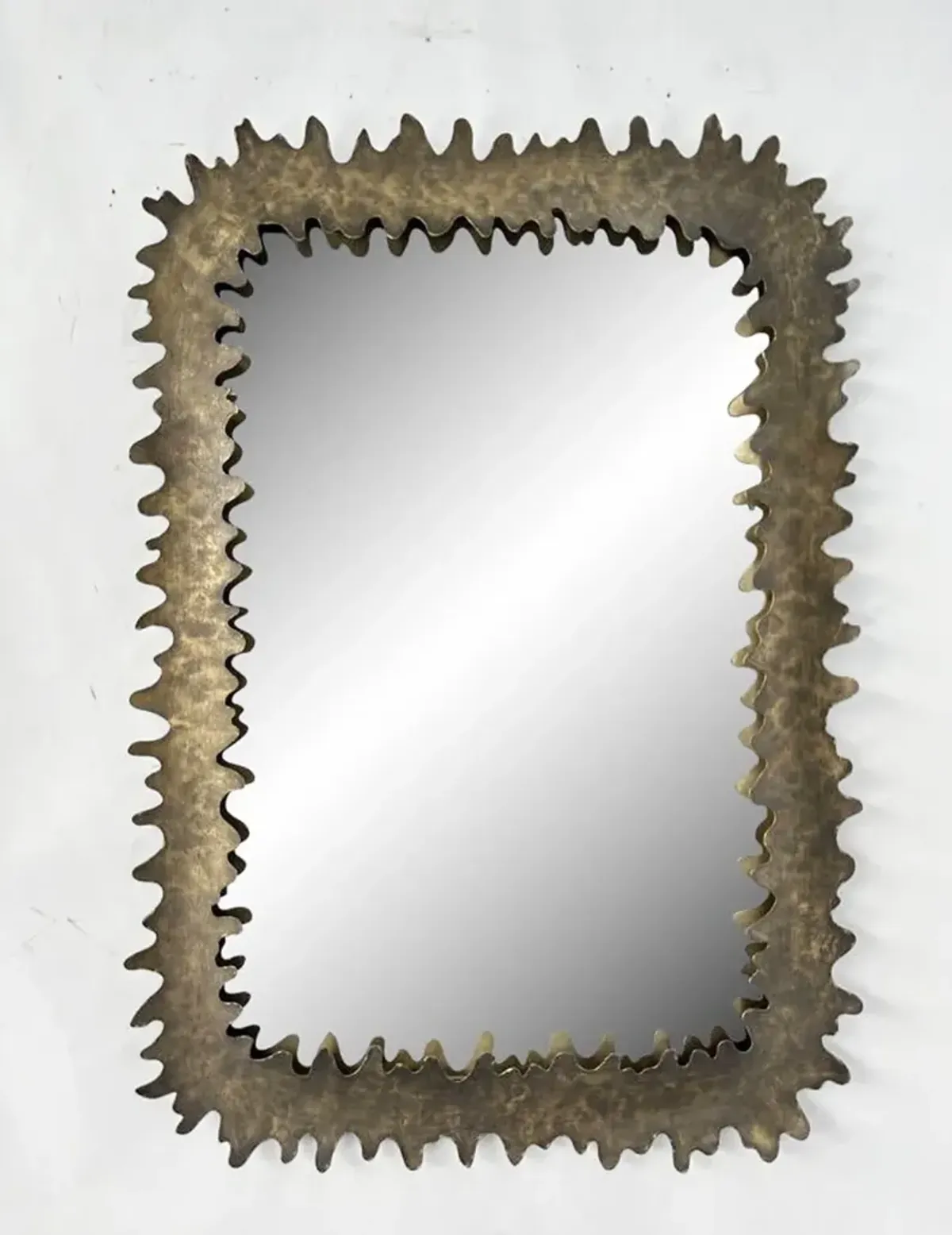 Serrated Elegance: Grandiose Metal Frame Wall Mirror