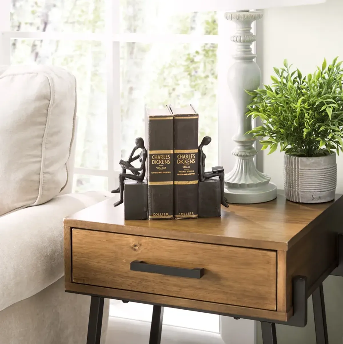 Man and Woman Reading on a Block Cast Iron Bookend Set