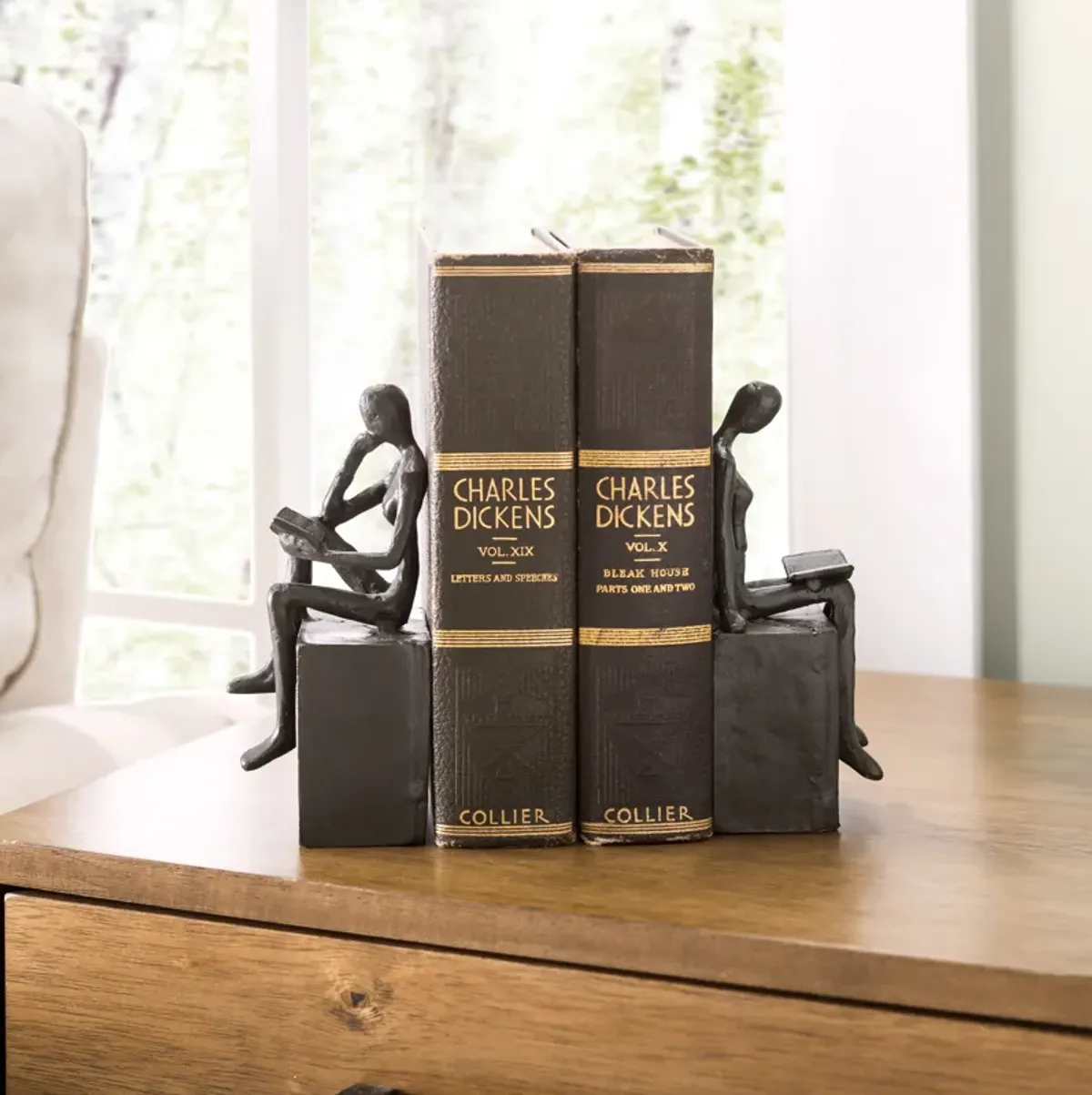 Man and Woman Reading on a Block Cast Iron Bookend Set