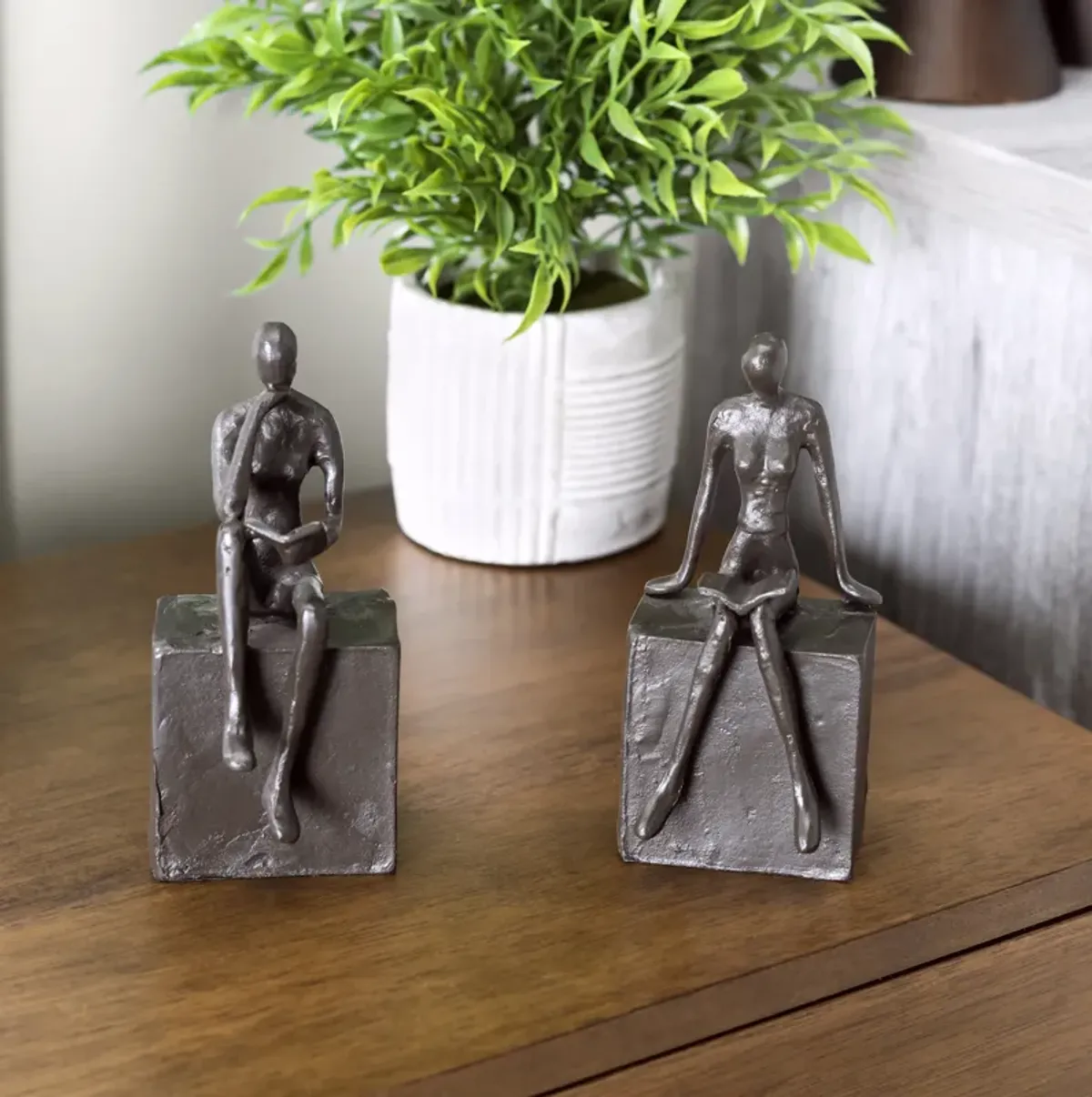 Man and Woman Reading on a Block Cast Iron Bookend Set