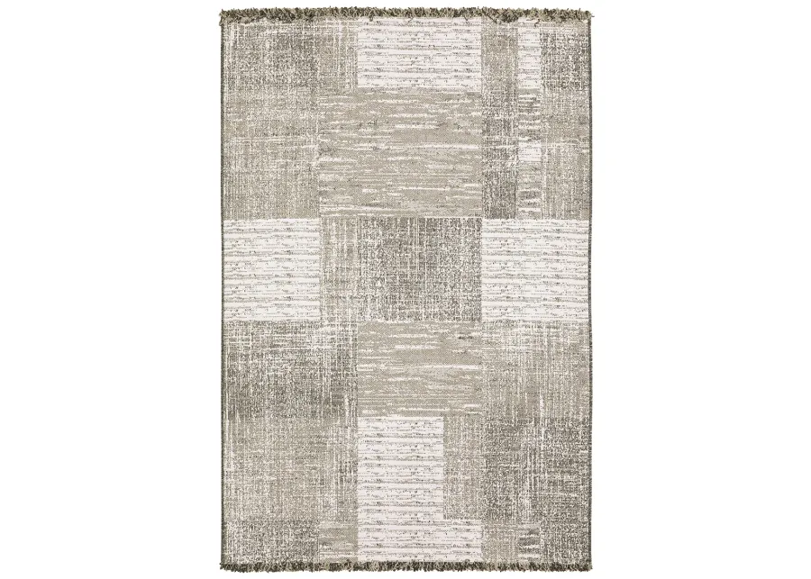 Gillian 9'10" x 12'10" Beige Rug