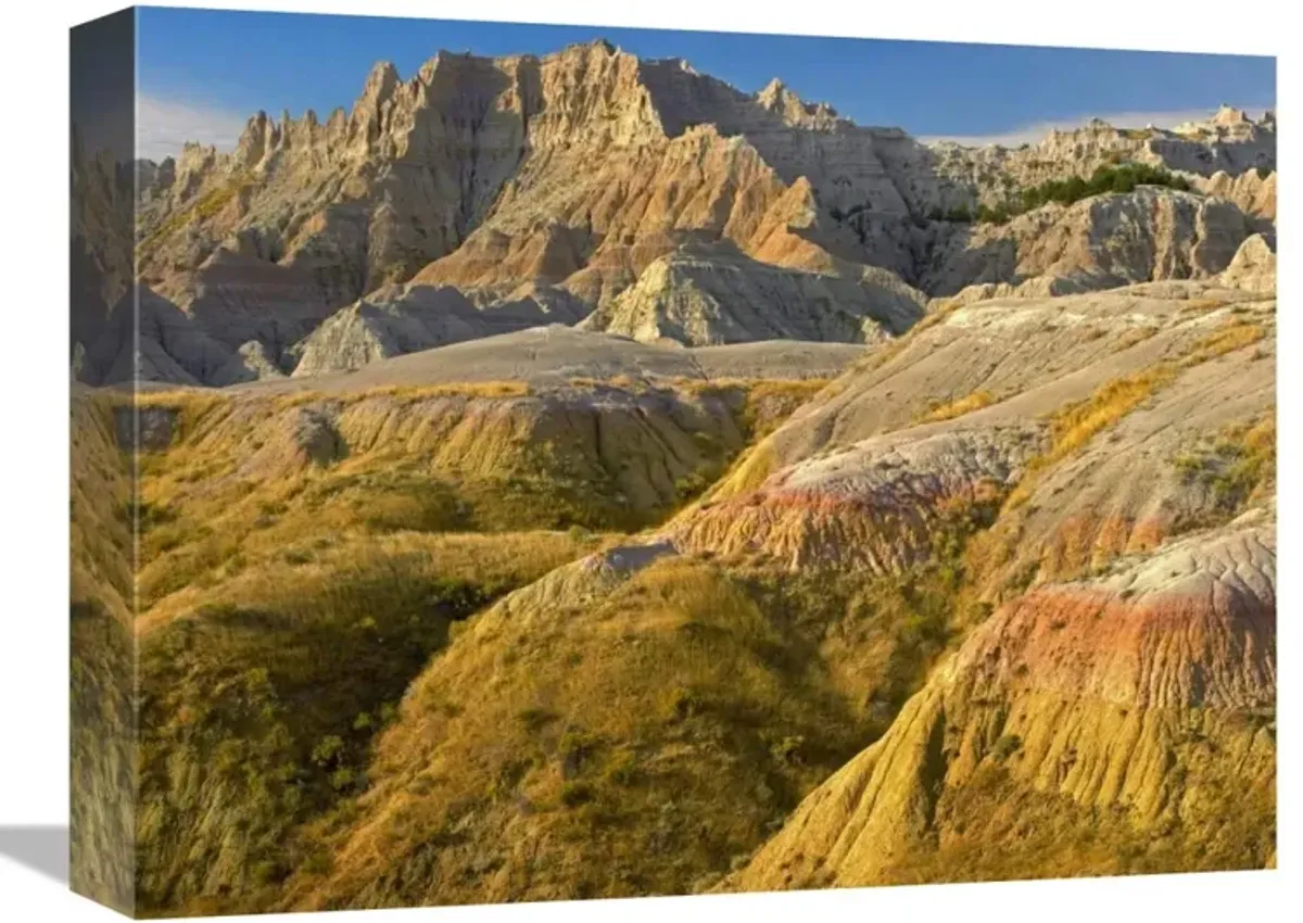 Eroded buttes showing layers of sedimentary rock, Badlands National Park, South Dakota-Canvas Art-16x12