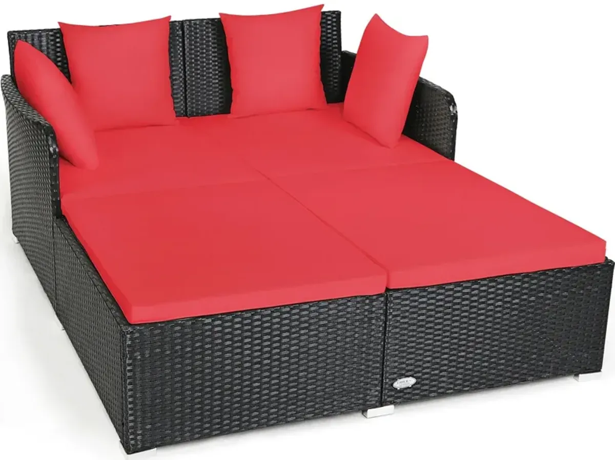 Spacious Outdoor Rattan Daybed with Upholstered Cushions and Pillows