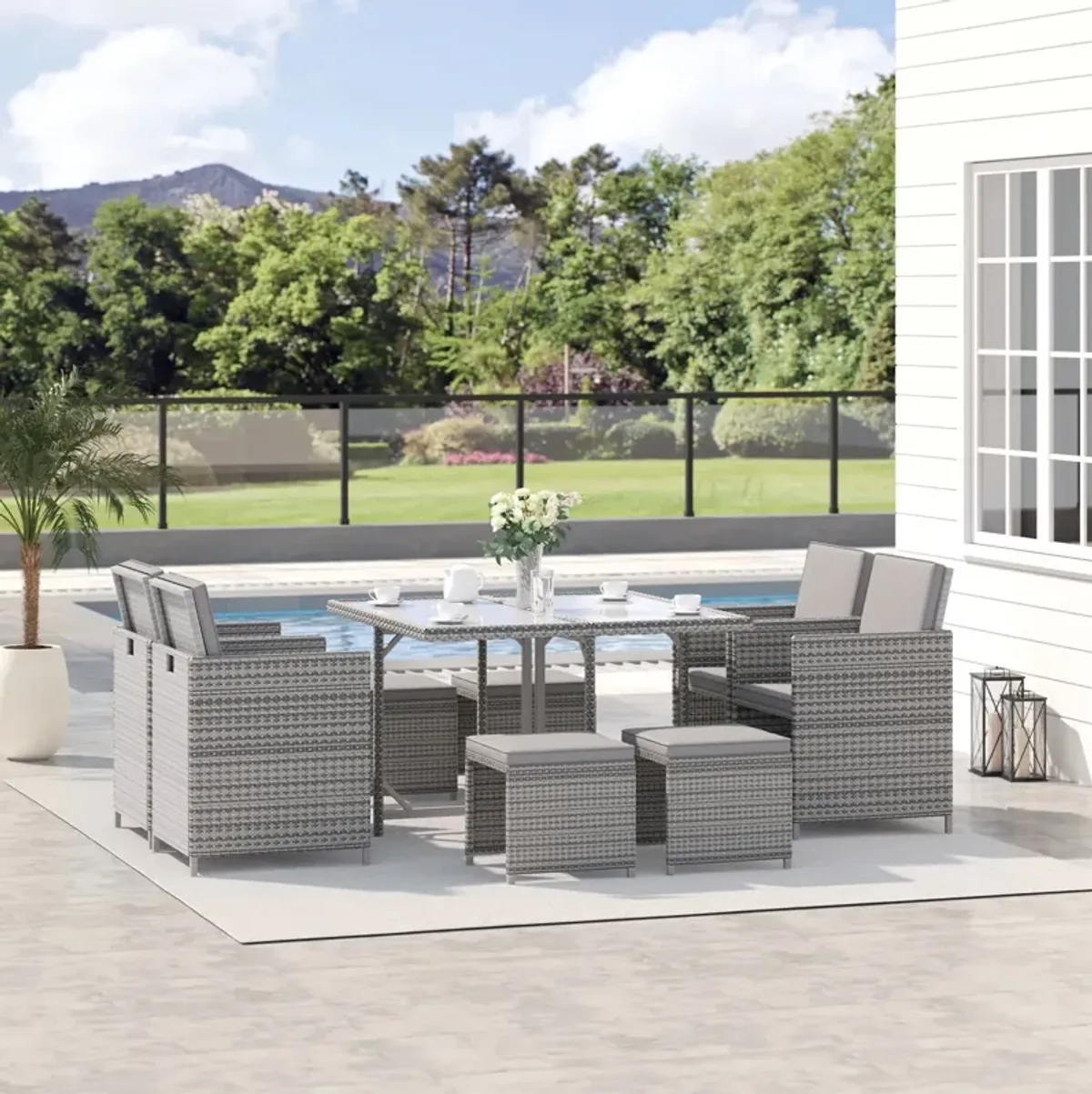 Outdoor Dining Ensemble: 9-Piece Wicker Set with Table and Ottoman