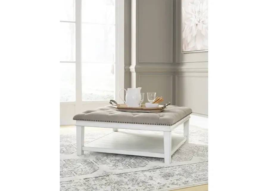 Kanwyn Upholstered Ottoman Cocktail Table