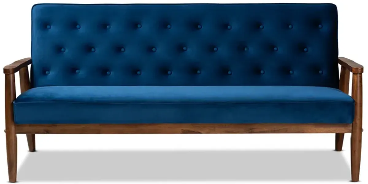 Baxton Studio Sorrento Navy Velvet Fabric Upholstered Walnut Finished Wooden 3 seater Sofa