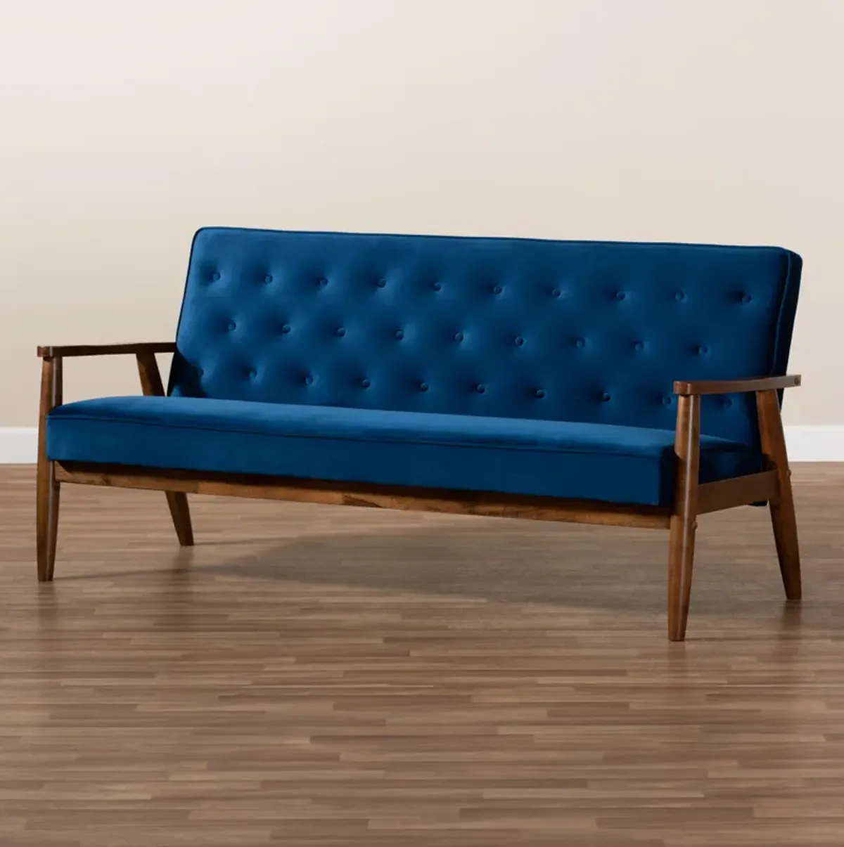 Baxton Studio Sorrento Navy Velvet Fabric Upholstered Walnut Finished Wooden 3 seater Sofa