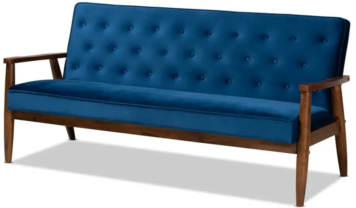 Baxton Studio Sorrento Navy Velvet Fabric Upholstered Walnut Finished Wooden 3 seater Sofa