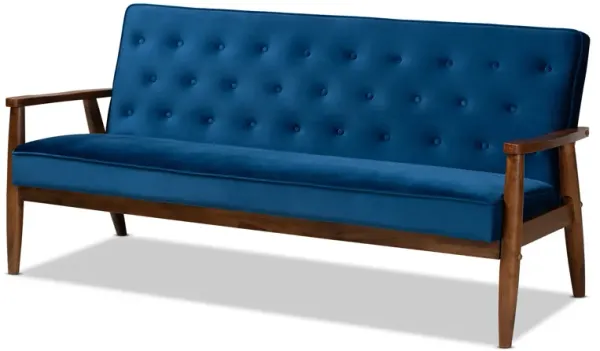 Baxton Studio Sorrento Navy Velvet Fabric Upholstered Walnut Finished Wooden 3 seater Sofa