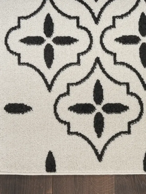 Nourison Essentials NRE04 Ivory/Black 5' x 7' Rug