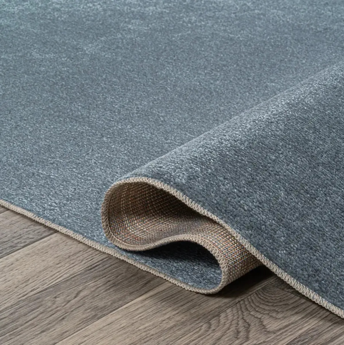 Twyla Classic Solid Low-Pile Machine-Washable Blue. Area Rug