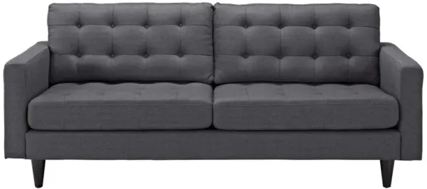 Empress Upholstered Sofa: Exquisite Design, Tufted Buttons, Luxurious Cushions, Elegant Armrests, Solid Wood Legs, Bonded Leather Upholstery.