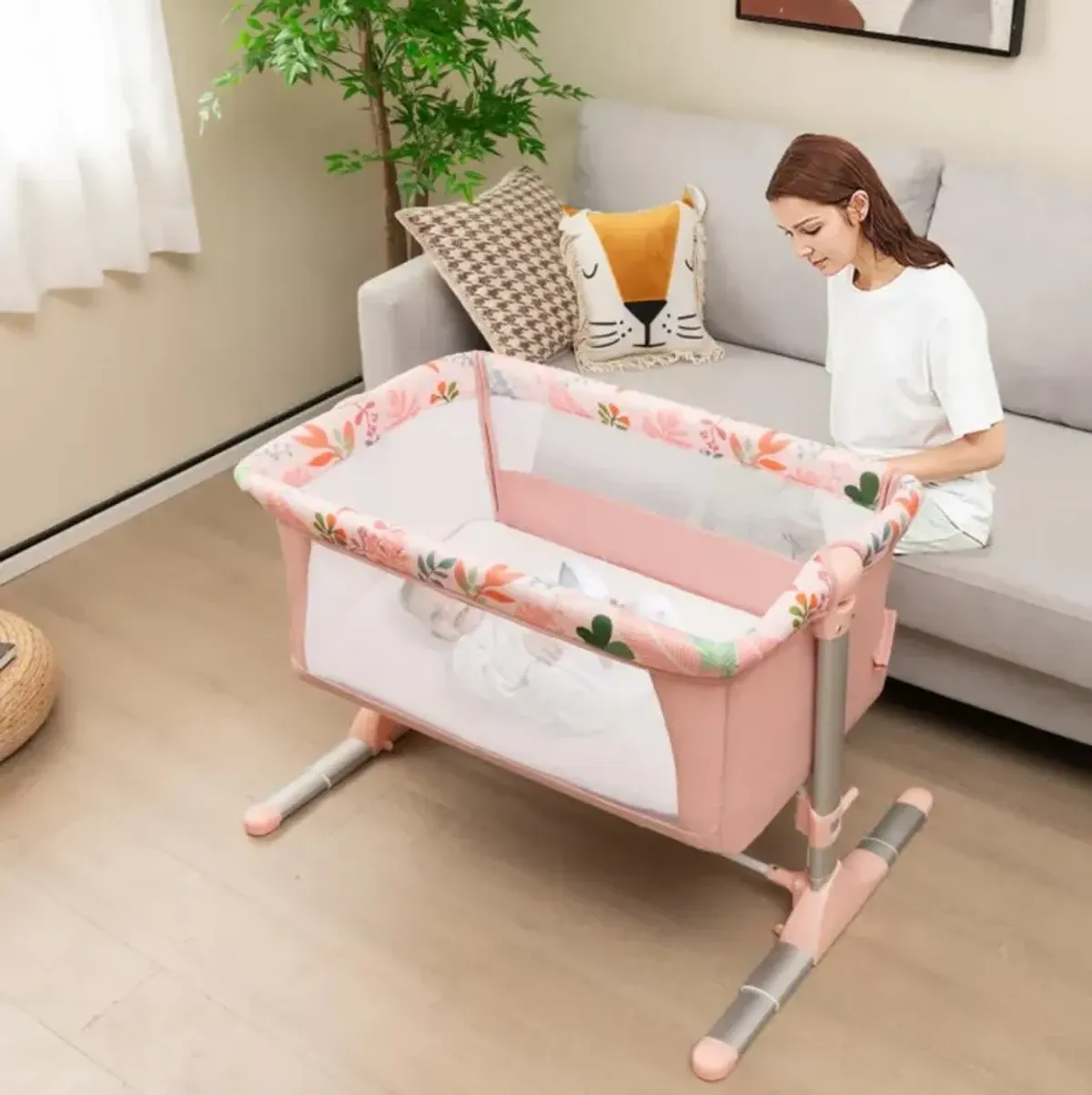 Folding Baby Bassinet Bedside Sleeper with 4 Adjustable Heights-Pink