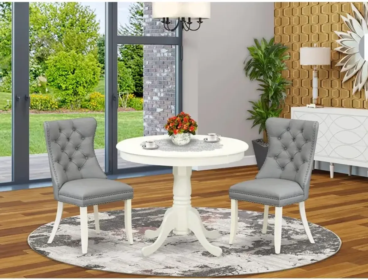 3 Piece Dining Set Consists of a Round Kitchen Table with Pedestal