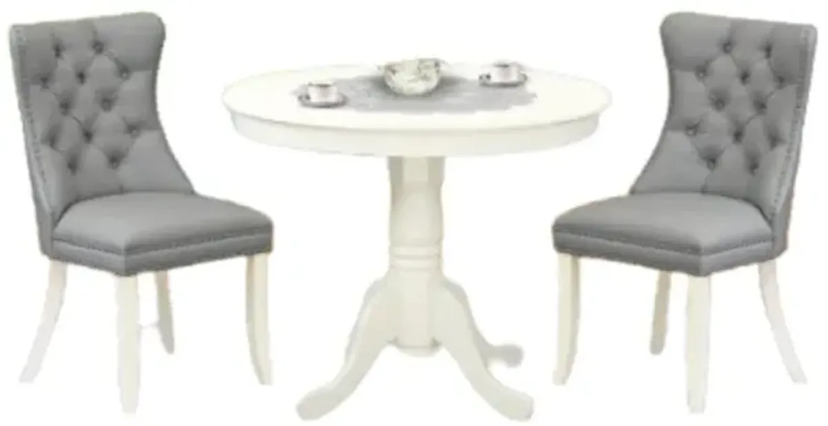 3 Piece Dining Set Consists of a Round Kitchen Table with Pedestal