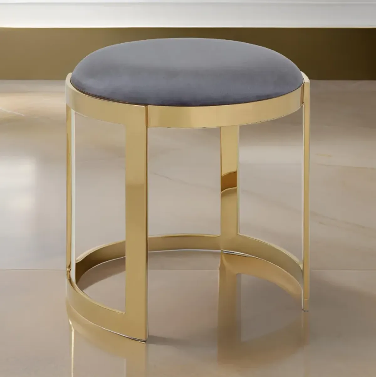 Niyo 19 Inch Accent Stool Ottoman, Round Cushioned Gray Velvet Seat, Gold - Benzara