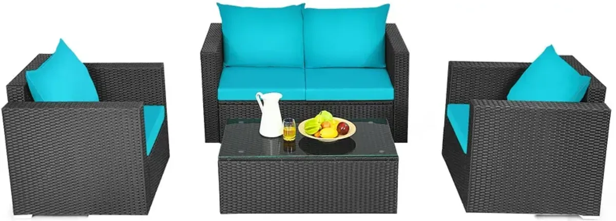 4 Pieces Patio Rattan Conversation Set with Padded Cushion and Tempered Glass Coffee Table