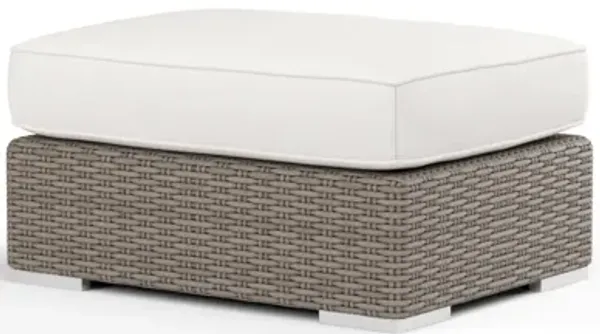 Coronado Ottoman in Canvas Flax w/ Self Welt