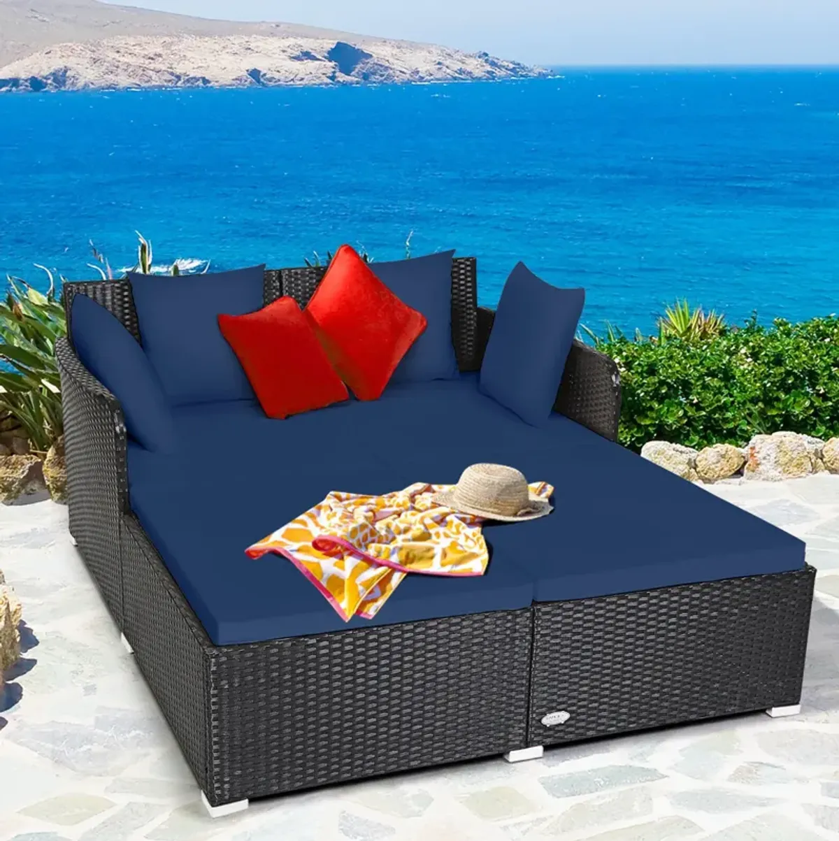 Spacious Outdoor Rattan Daybed with Upholstered Cushions and Pillows