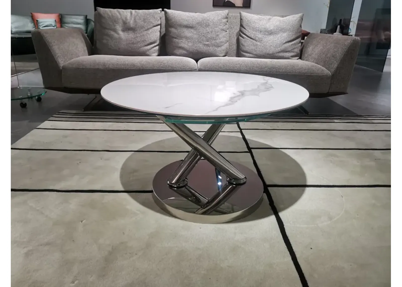 Motion coffee table with one ceramic top and one clear glass top