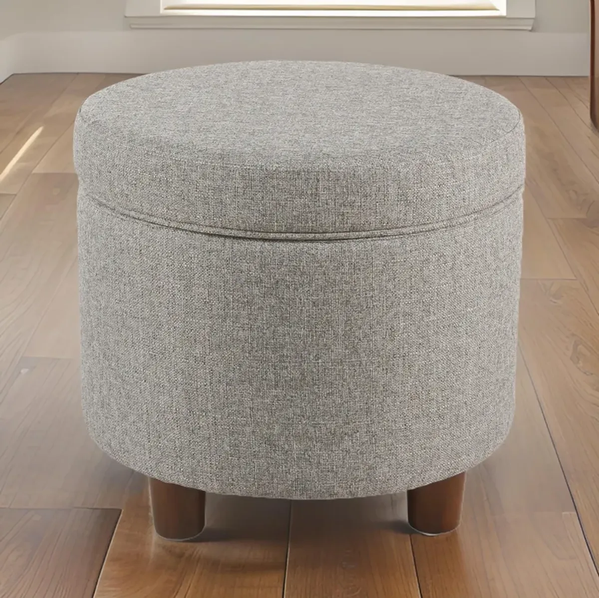 Fabric Upholstered Round Wooden Ottoman with Lift Off Lid Storage, Light Gray - Benzara