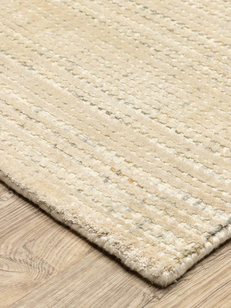 Circa 5' x 8' Beige Rug