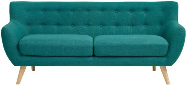 Exquisite Remark Sofa: Luxurious, Stylish, and Comfortable. Organic Shape, Mid-Century Inspired Legs. Polyester Upholstery with Fine Stitched Buttons. Elevate Your Space with this Modern and Sophisticated Piece. Teal Color.