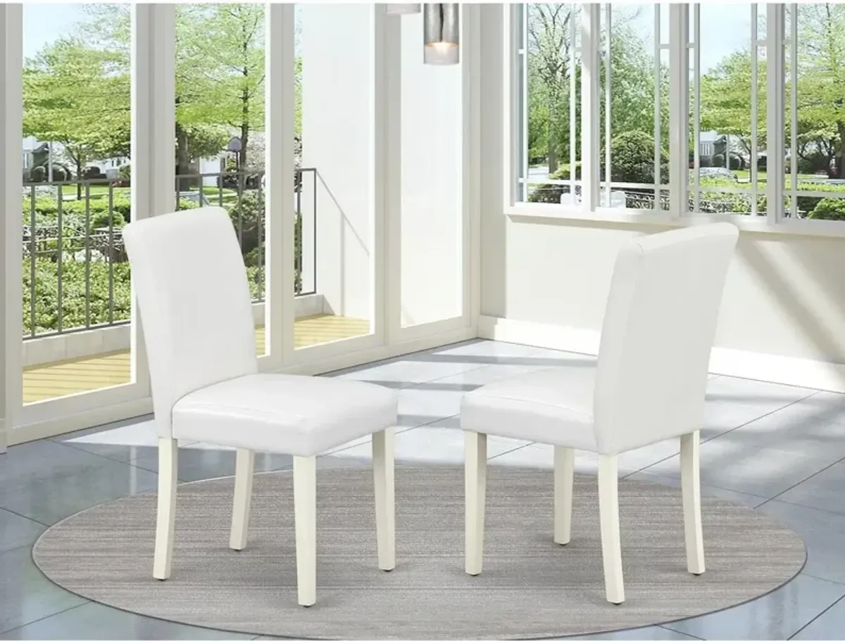 East West Furniture ABP2T64 Classic Parson Dining White Faux Leather Upholstered Chairs, Set of 2