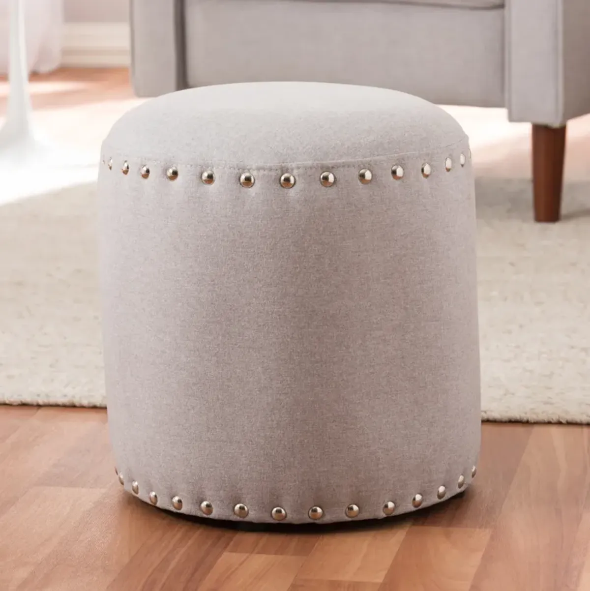 Baxton Studio Rosine Modern and Contemporary Light Grey Fabric Upholstered Nail Trim Ottoman