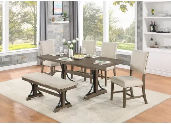 7 piece dining set in brown oak with matching beige linen side chairs and bench