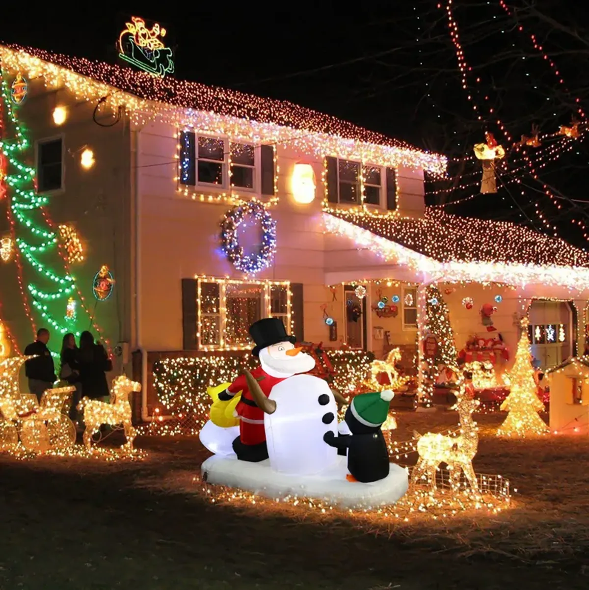 LuxenHome 6Ft Santa Snowman and Penguin Inflatable with LED Lights