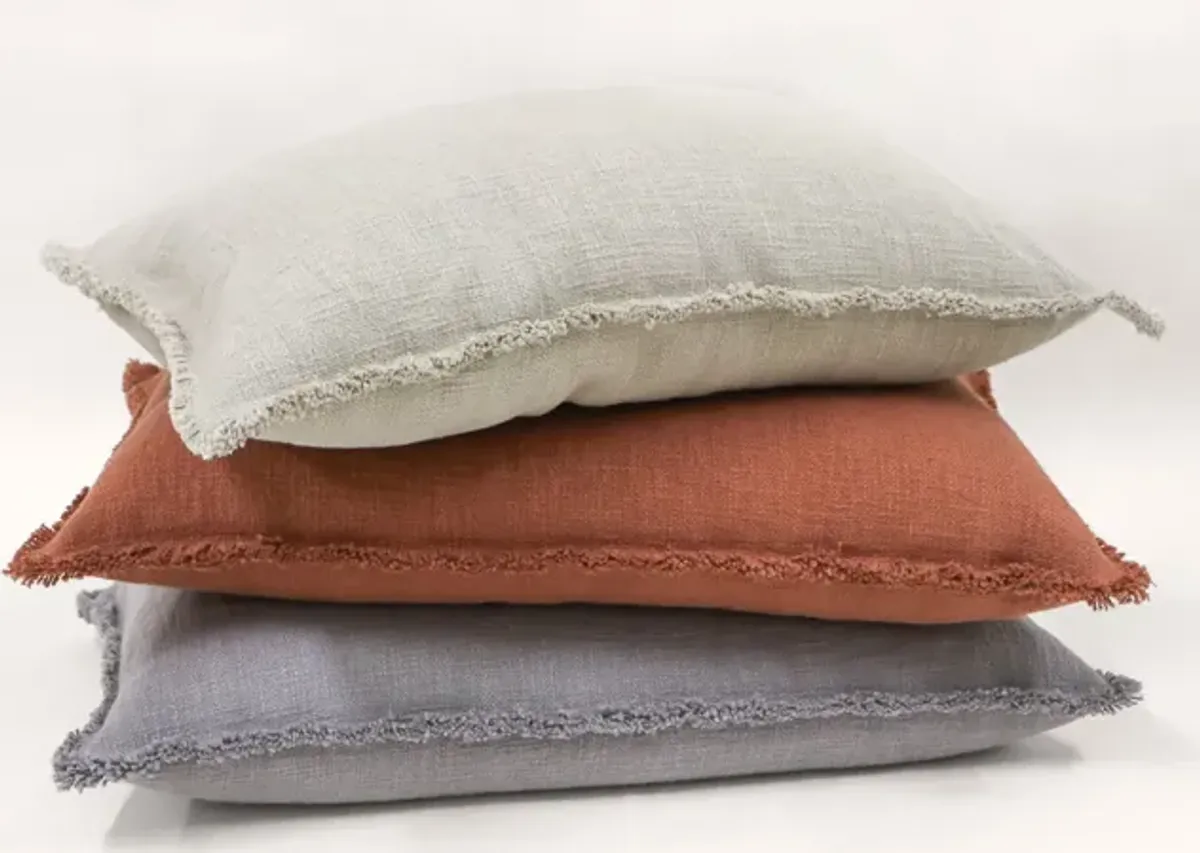 Organic Chic washed textured cotton solid lumbar pillow with frayed edges