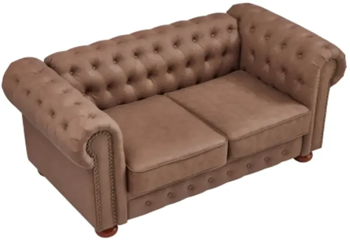 The living room is made more cozy and comfortable with a brown faux leather classic chesterfield sofa chaise lounge.