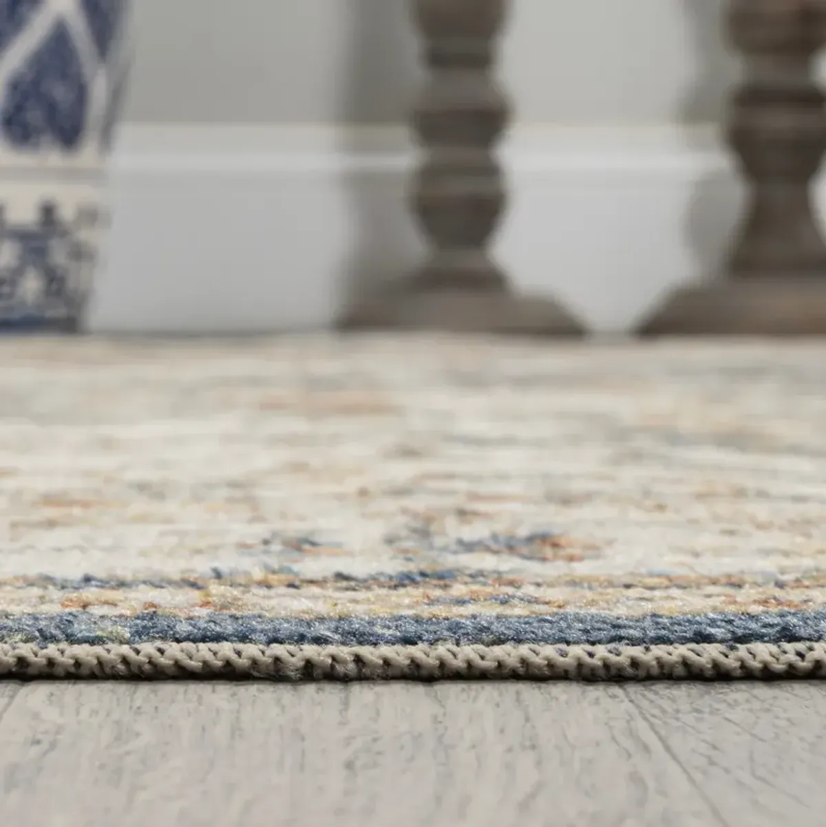 Keesha Bold Distressed Medallion Low-Pile Machine-Washable Blue/Cream. Area Rug